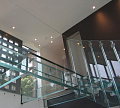Стеклянные полы на площадке маршевой лестницы в Алматы. Готовые проекты ПерилаГлавСнаб - фото 1